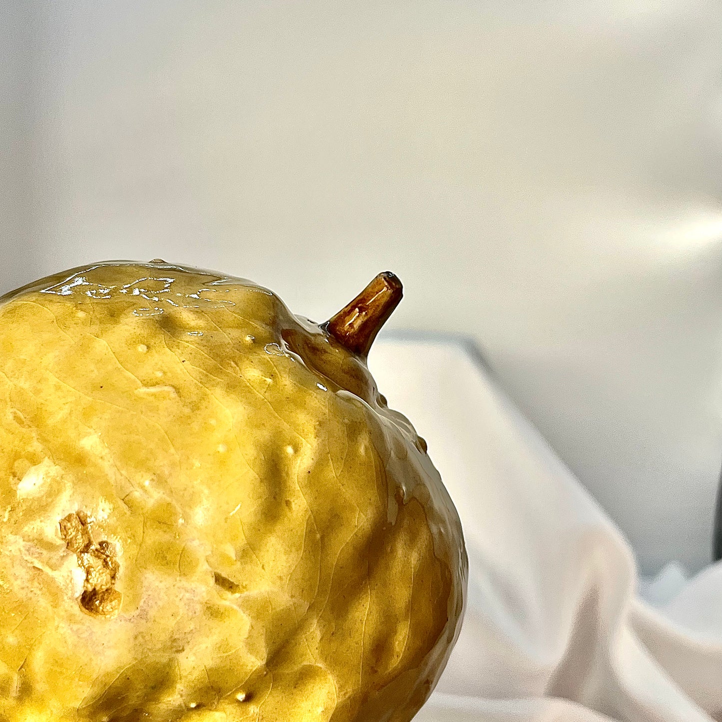 Quince in glaze figurine