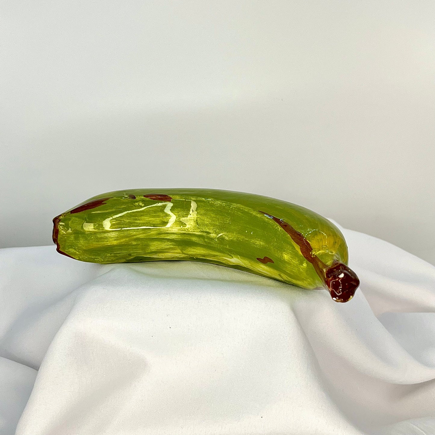 Green banana in glaze figurine