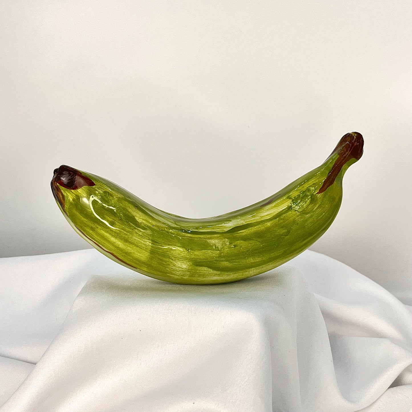 Green banana in glaze figurine
