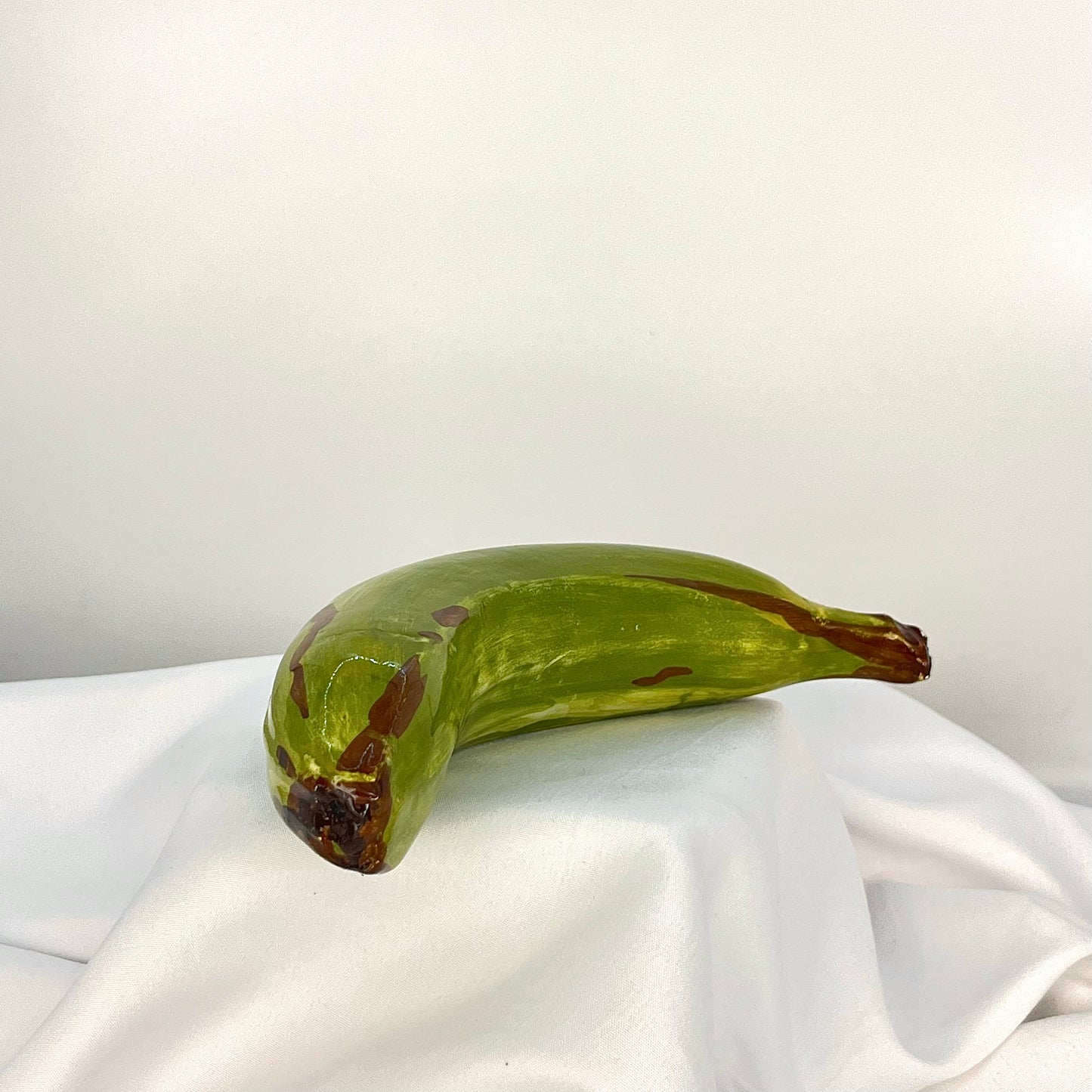 Green banana in glaze figurine